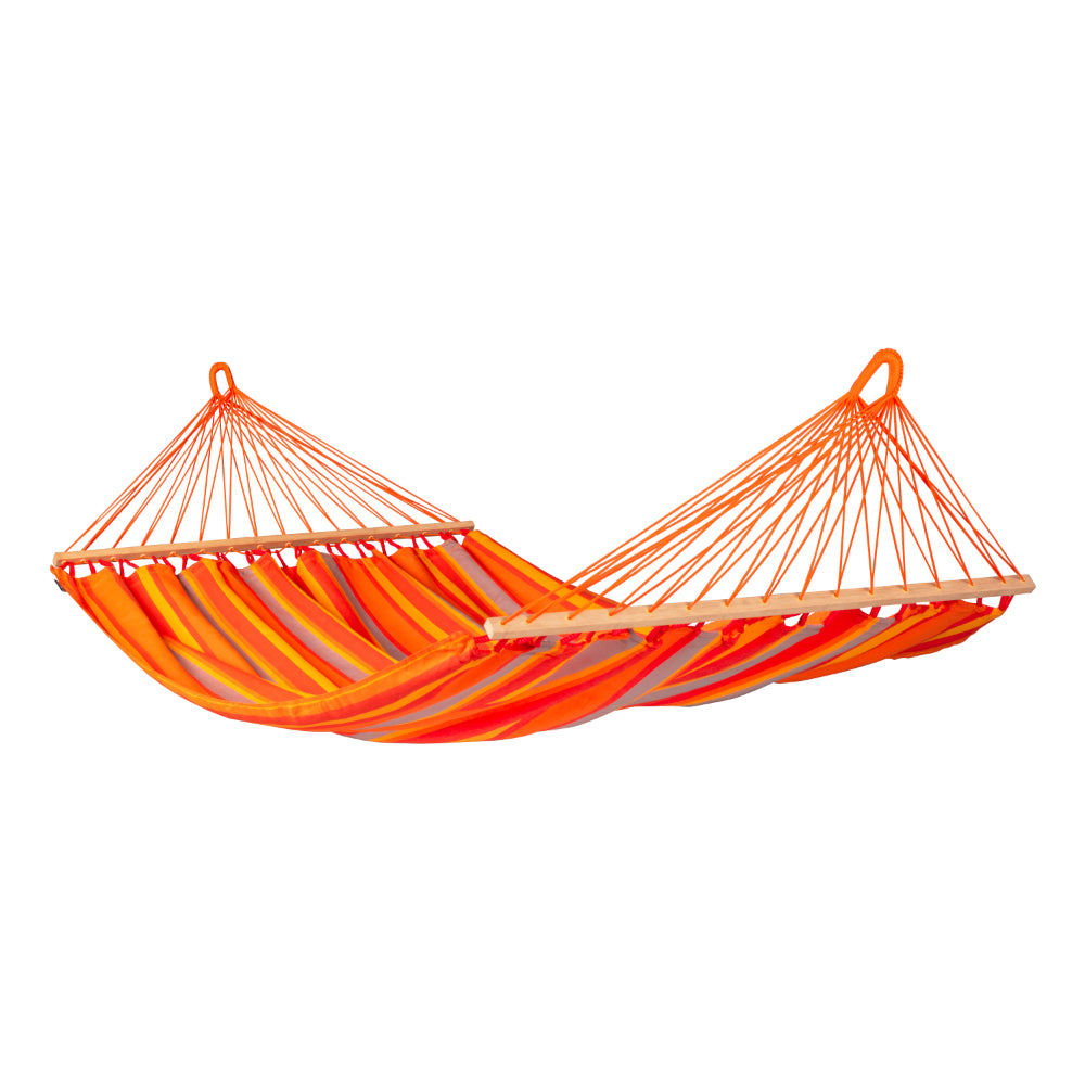 Two people relaxing in bright coloured hammock