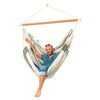 Man resting in hammock chair