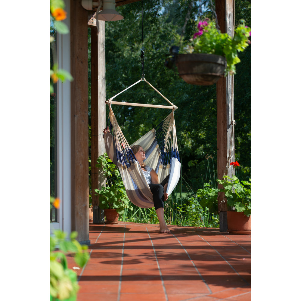 Sea Salt - Blue and White Hammock Chair Hung from Overhead Beam
