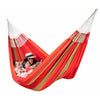 Hammock reading a book together in large red cotton hammock
