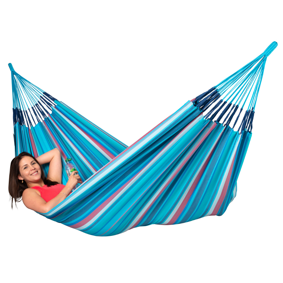 Woman relaxing in hammock - blue