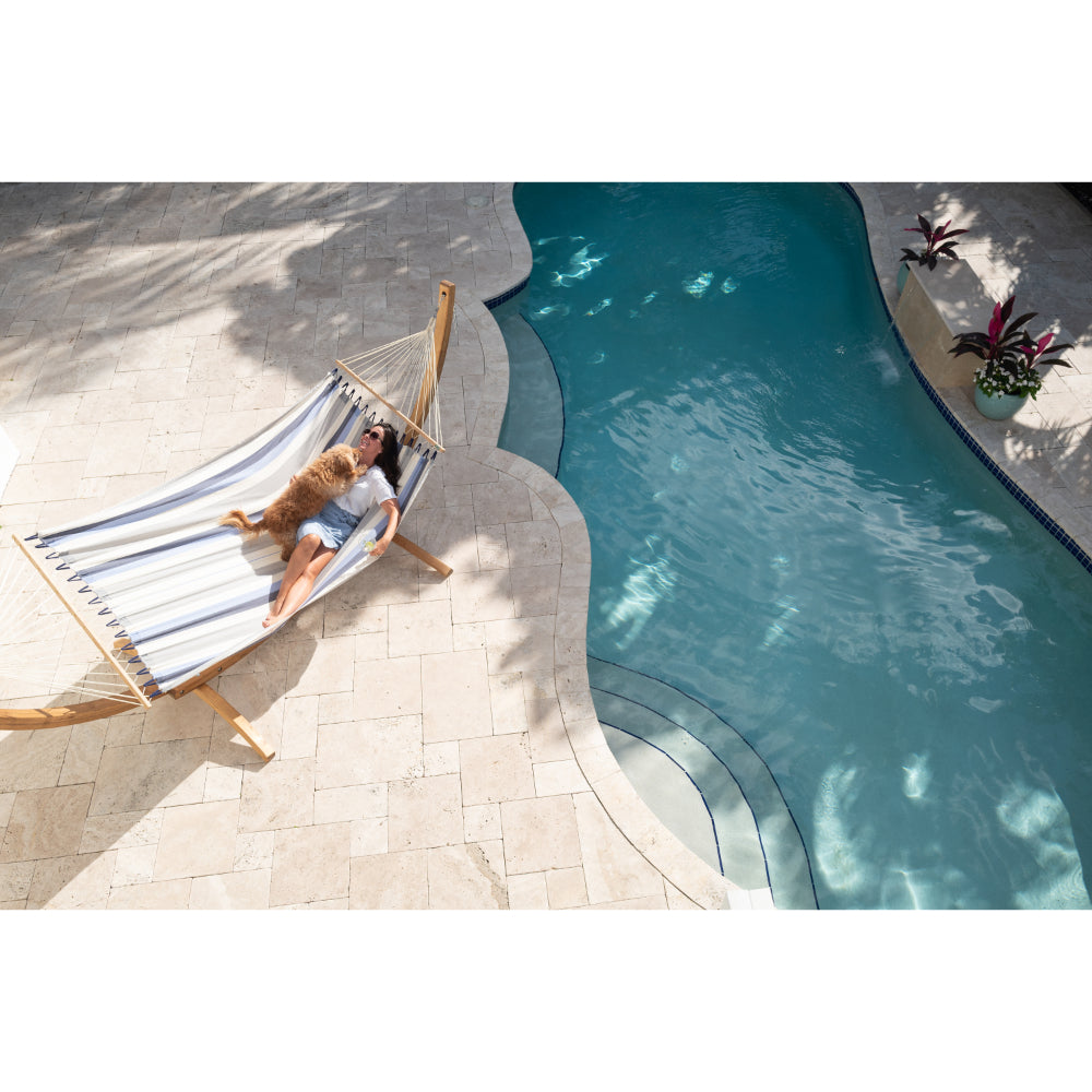Overhead view of hammock and stand by swimming pool