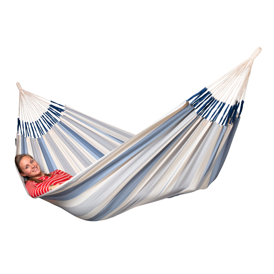 Women smiling in hammock